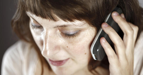 Woman On Phone Worried